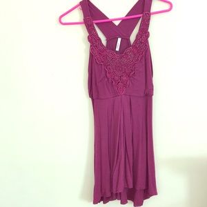 Women’s purple top.